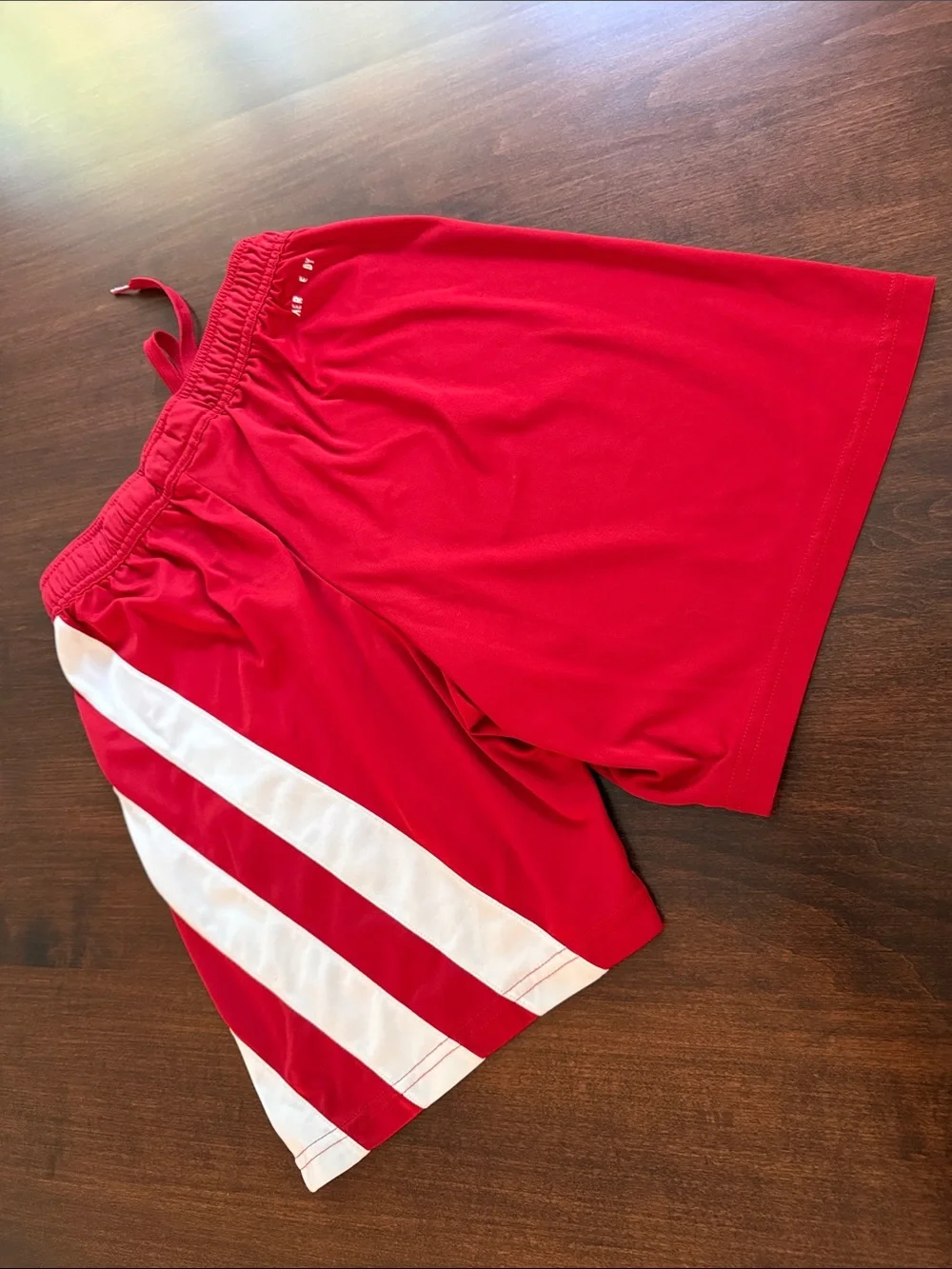 adidas Red Athletic Shorts with White Side Panels. Size S. Waist 24”plus stretch